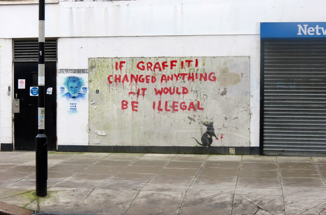 STREET ART BY BANKSY THAT THE LONDON BOROUGH OF CAMDEN COUNCIL OPTED TO PROTECT WITH PLEXIGLASS