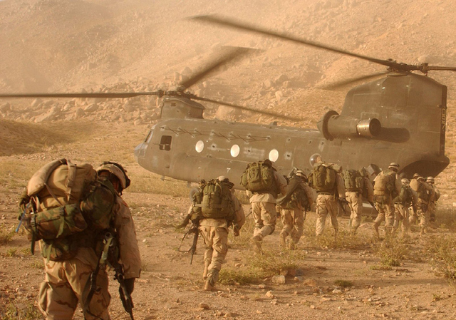US soldiers board a CH-47 Chinook helicopter during a military operation in Afghanistan.