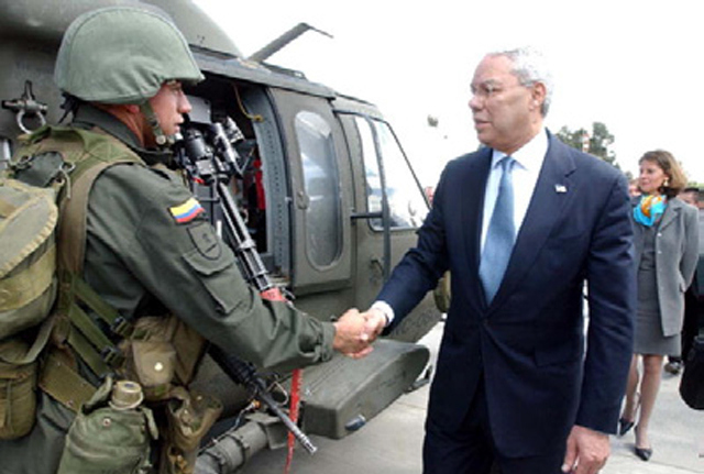 Fmr. Secretary of State Colin Powell greeting Colombian Military personnel.
