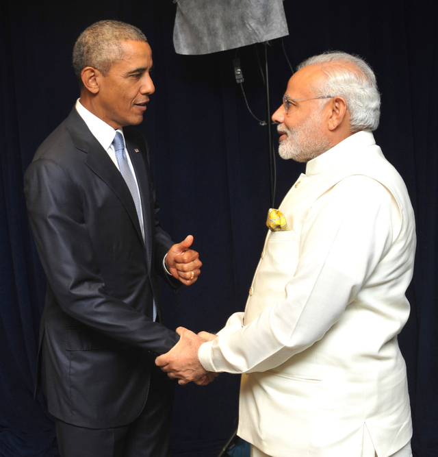 President Barack Obama shaking hands with Prime Minister Narendra Modi.